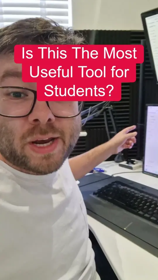 Marty Englander at his desk, pointing at a monitor, under the caption “Is This The Most Useful Tool for Students?”